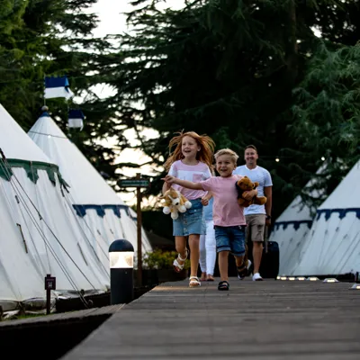 Excited children glamping