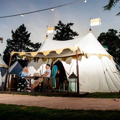 Parents outside tent 2